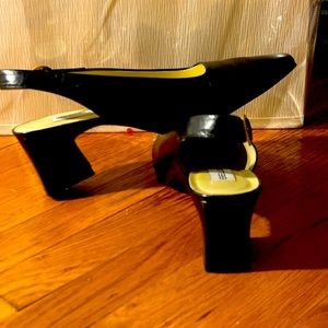 LIKE. NEW!  Black, leather sling back with 2 inch heel..